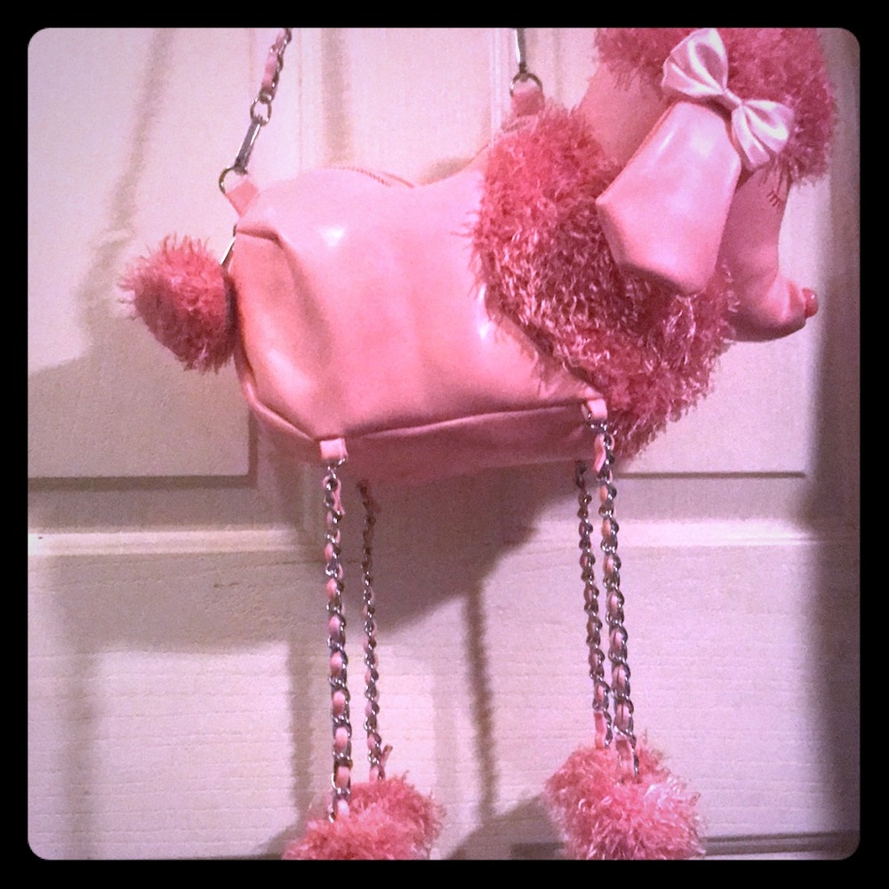 Dolls kill pink poodle purse say that 3x fast!